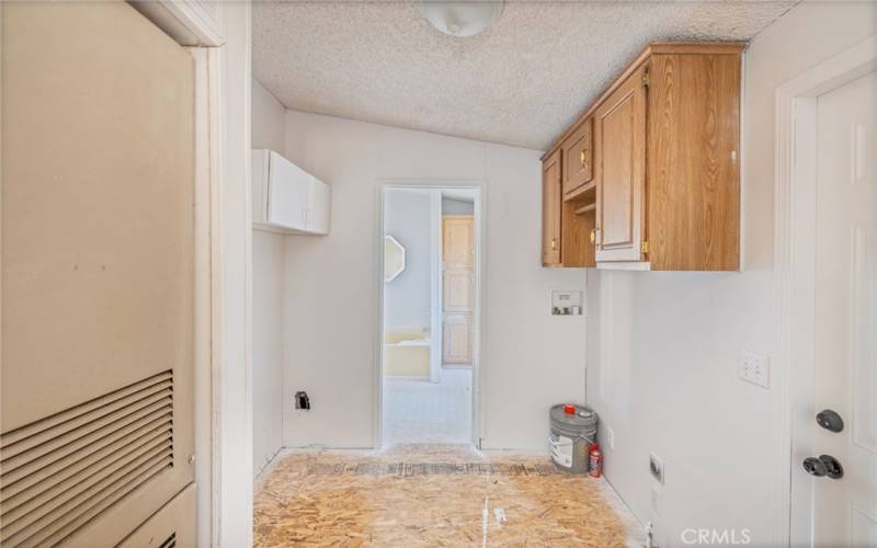 Laundry Room.  Photo taken prior to new carpet being installed!