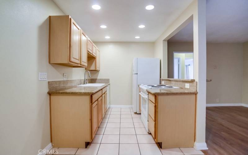 wonderful cabinets, granite counters plus, stove and fridge included, just bring the food and drink and you are all set.