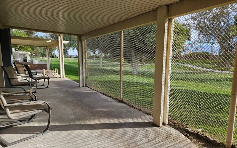 Patio with screen to block golf balls!