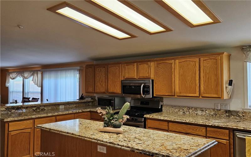 Kitchen with granite counter tops & island