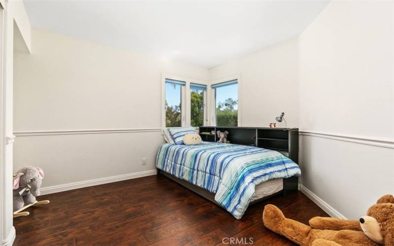 Guest bedroom upstairs with twin size bed.