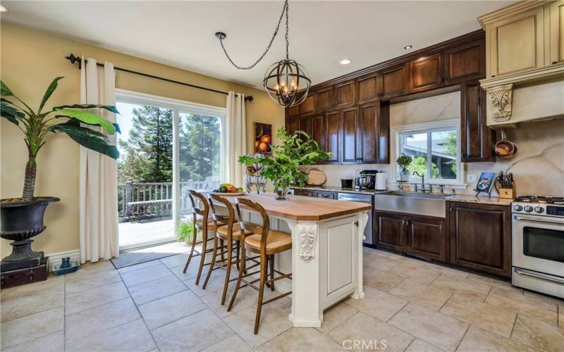 This open concept kitchen with custom features will inspire the gourmet in you!