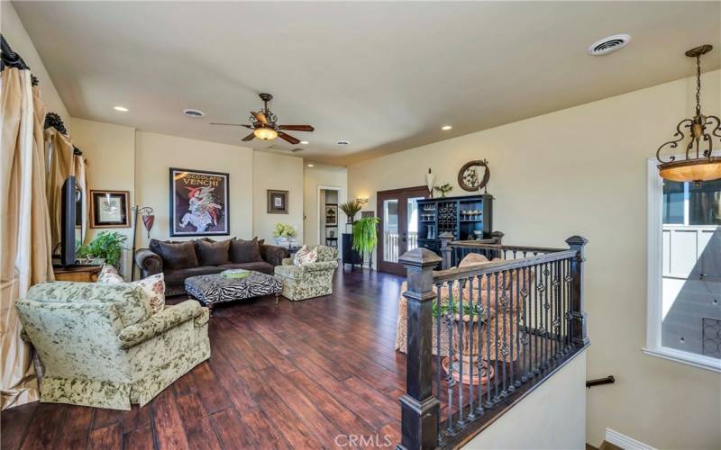 A large family room upstairs separates the two ensuite bedrooms.