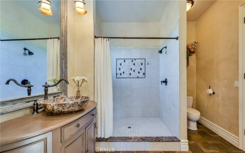 Exquisitely appointed downstairs bathroom.