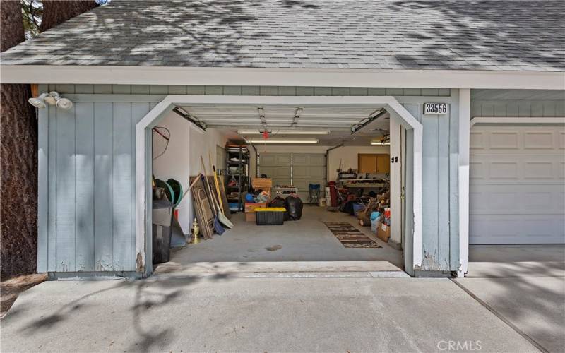 Concrete Driveway leads into garage