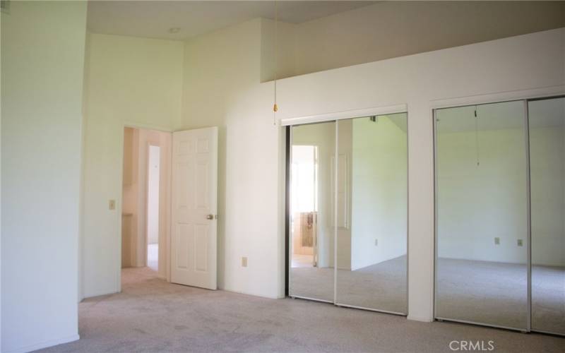 Primary Bedroom double mirrored closets