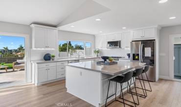 Totally remodeled kitchen with large island and views