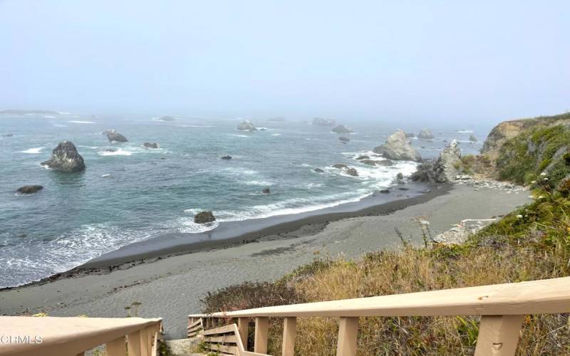 Public beach land adjacent to property.