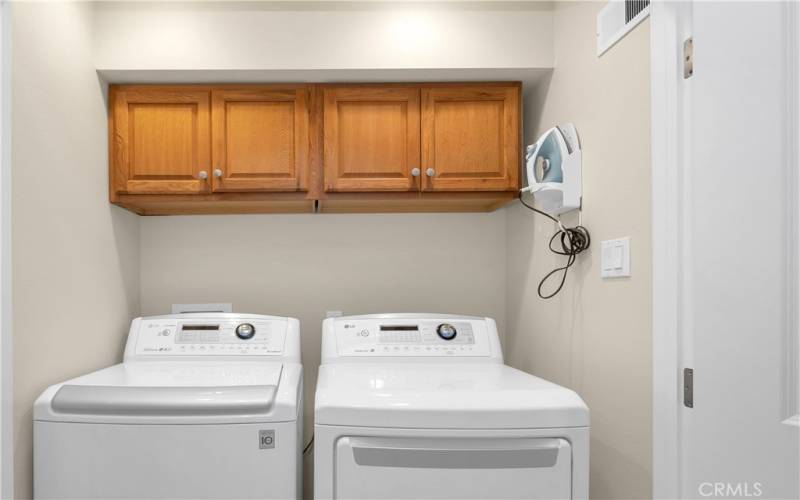 Laundry Closet with Built in Storage Conveniently Located Upstairs!