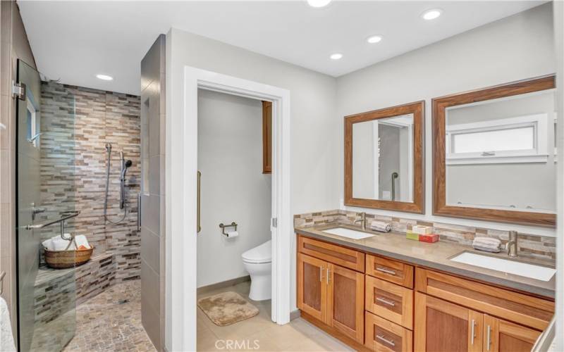 Double Vanity, Large Custom Shower with Built-in Seating, and Private Water Closet!