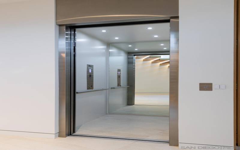 Large stainless steel elevator with automatic doors