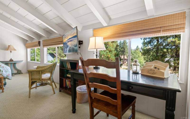 Bonus room/ lives as 3rd bedroom with tree view, feeling like your staying in a tree house.