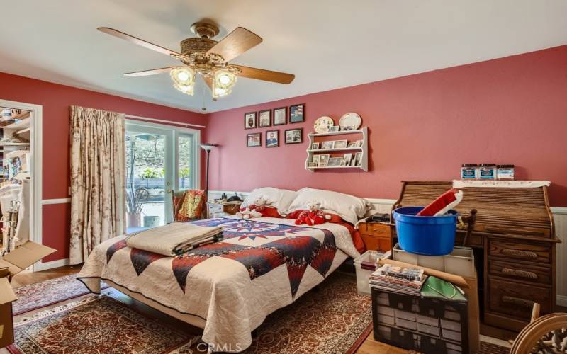 Secondary bedrooms feature ceiling fans, walk-in closets, and private patios.
