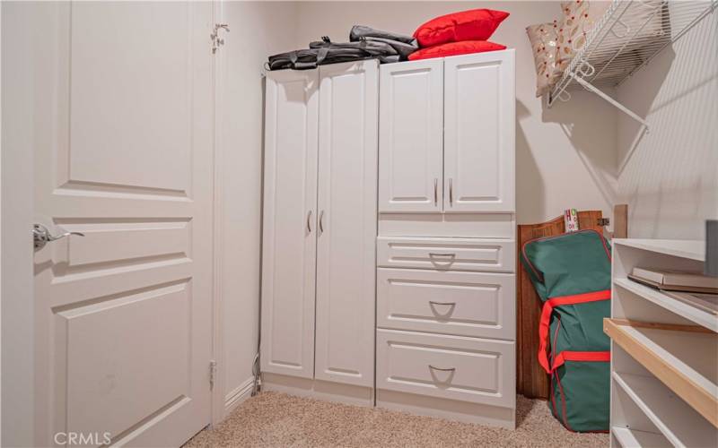 Built-ins inside the walk-in closet are all staying!