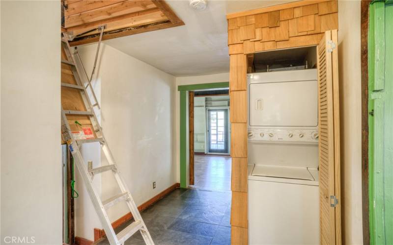 Pull-down stairs to Loft area, washer and dryer in closet to the right