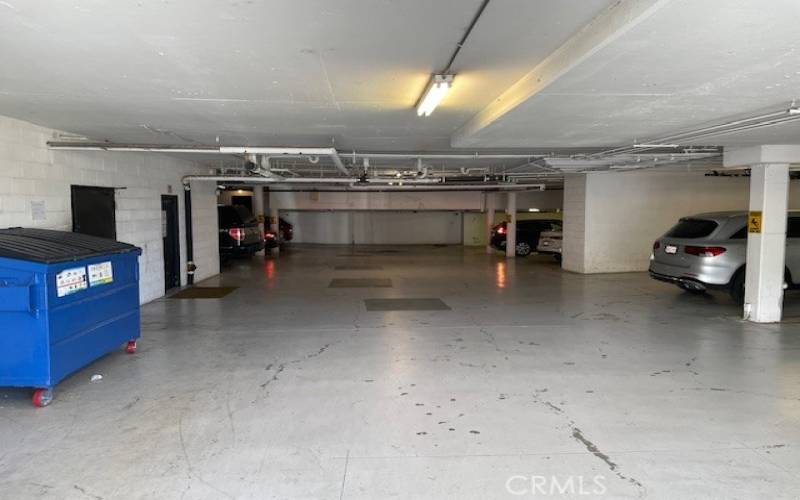 Two side-by-side parking spaces in underground garage

