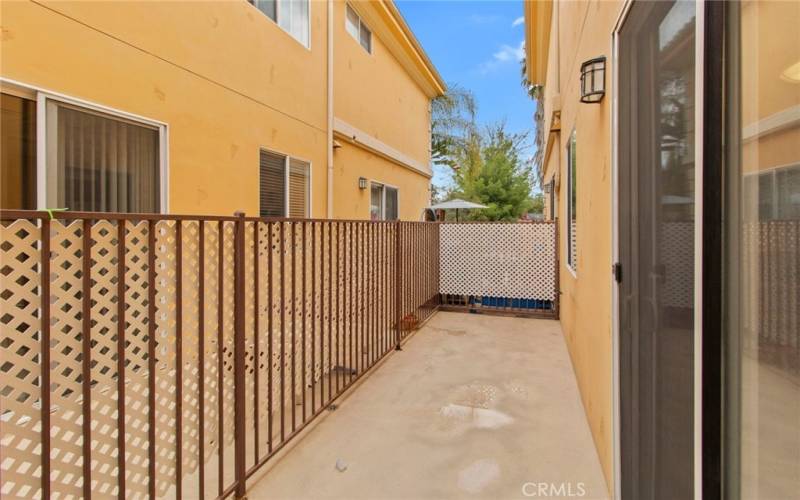 Photo of a similar unit in the complex and not of the subject property. Patio off the kitchen.