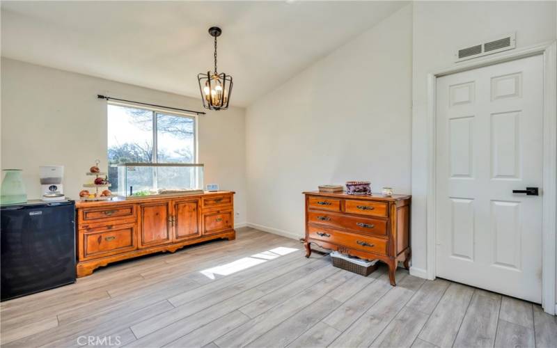 Second dining area leads to Primary bedroom.