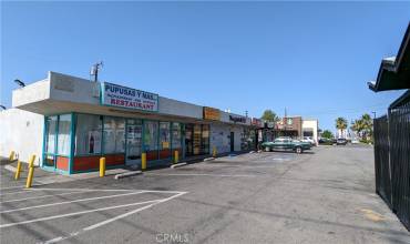 View of strip center and neighboring Starbucks