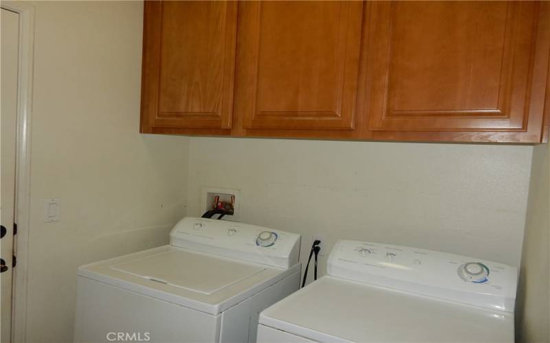 Laundry room leads to the garage for direct entry.
