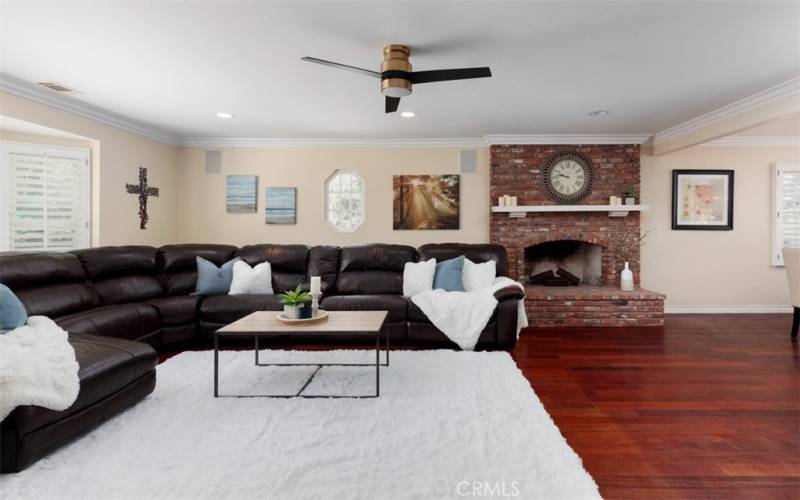 Living Room with ceiling fan and hardwood floors