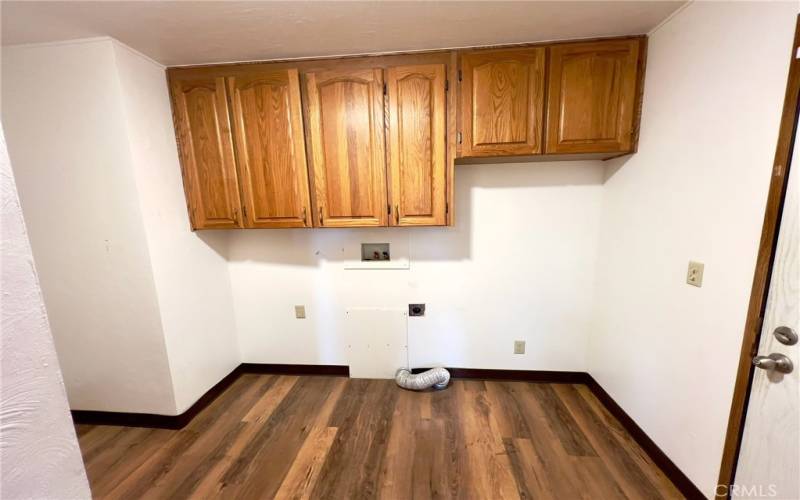 Laundry Room, With 220V outlet for electric dryer.