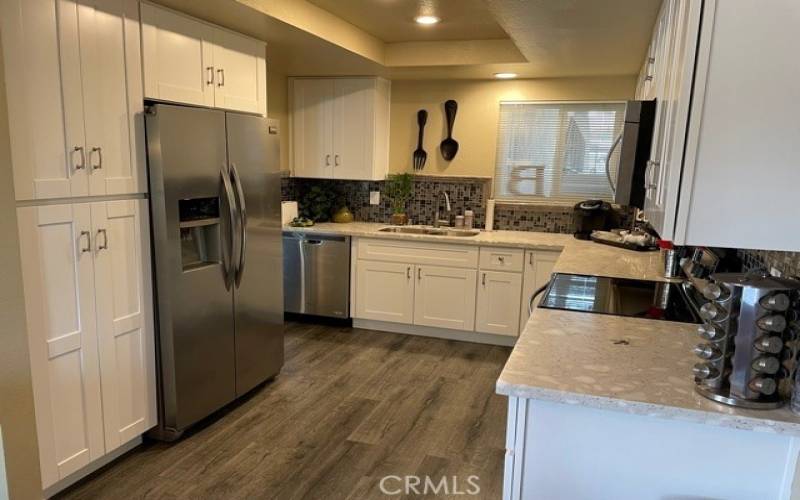 Remodeled Kitchen with Quartz Countertops.