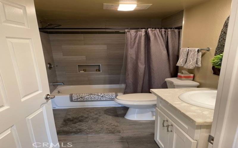 Hall Bath with tub/shower combo.