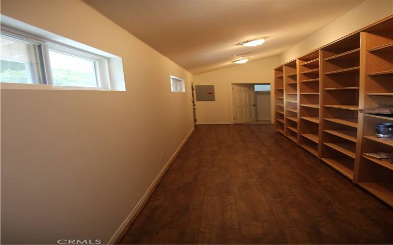 Hallway with built in bookcases