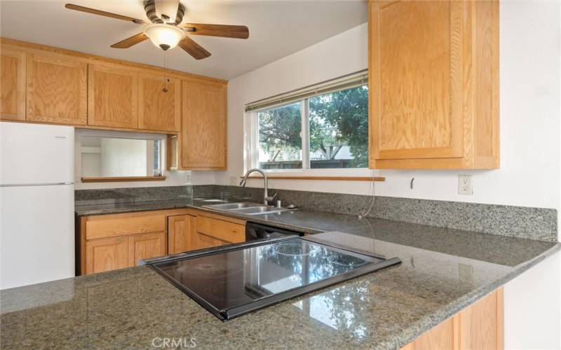 Unit #20-Kitchen with granite countertops.