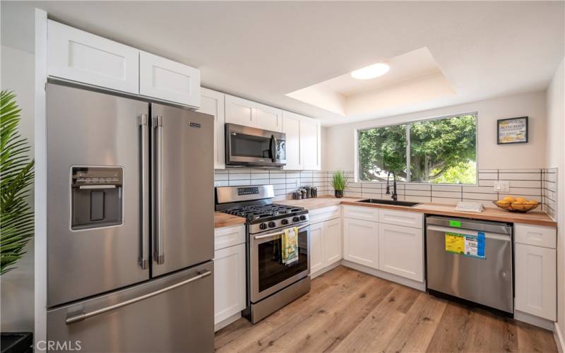 Fully remodeled kitchen with stainless steel appliances
