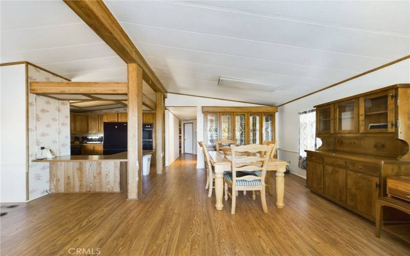 Living room looking into dining area and kitchen