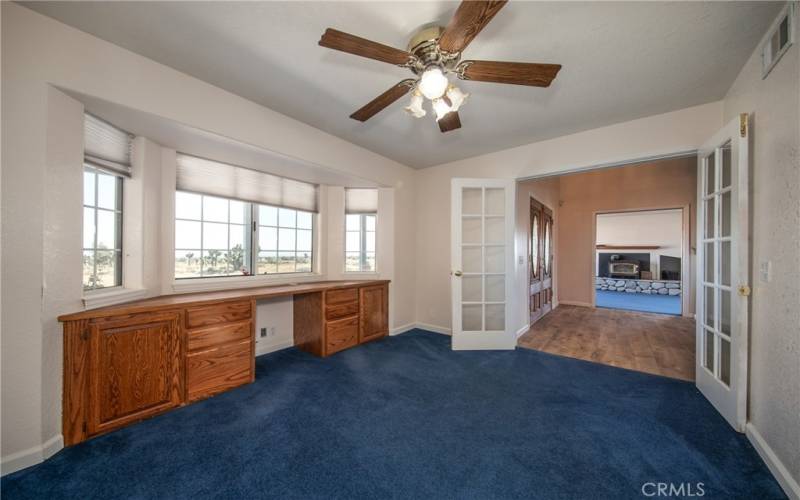 Downstairs den with builtin desk area