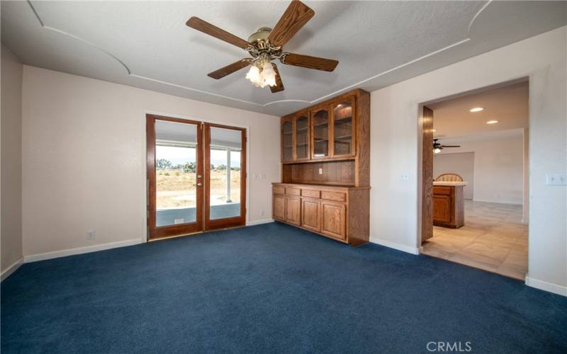 dining area in living room with builtins