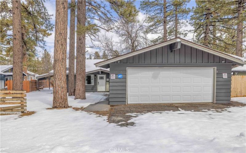 Front of garage and driveway. Ample parking!