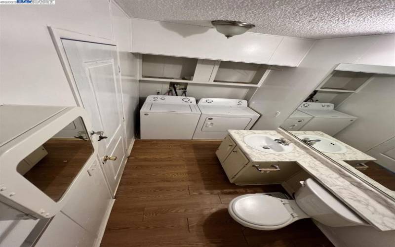 Main BR bathroom with washer dryer