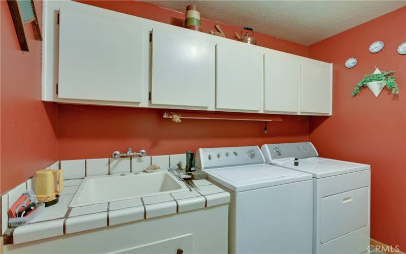 Laundry room, lots of cabinets