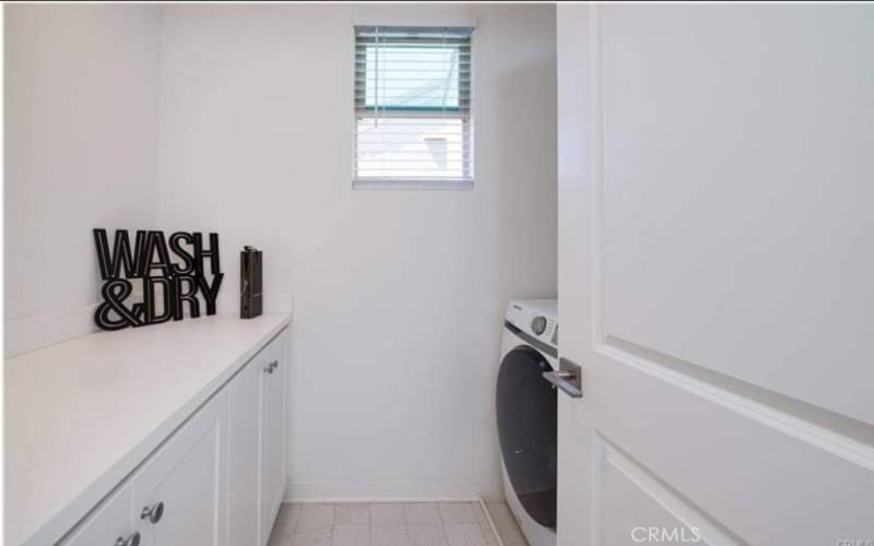 Laundry room is located upstairs.