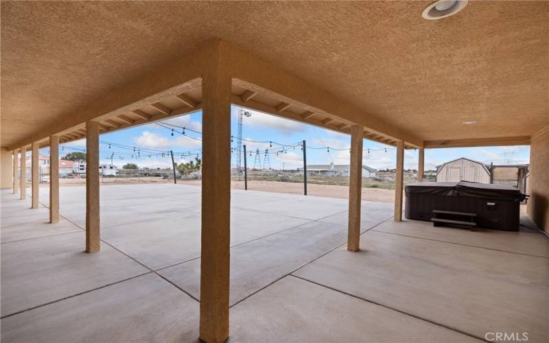 Large patio extends the full length of home.