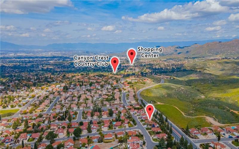 Drone photo allows you to see the Canyon Crest Country Club is a few blocks away, down the Canyon Crest road. The Canyon Crest shopping center is also closeby