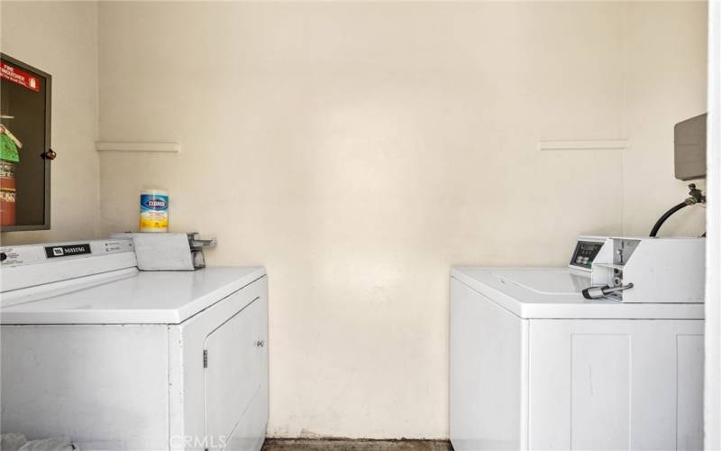 Laundry Room with Coin Operated Washer and Dryer (Electric Dryer)
