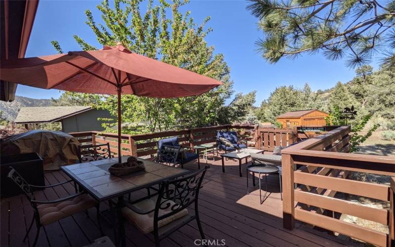 The back deck offers plenty of room for sitting and socializing, for barbecuing and for dining.
