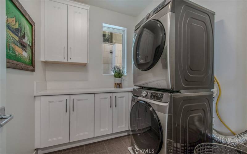 Laundry Room on second level between bedroom suites