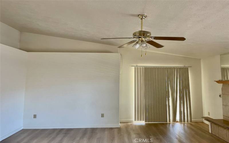 Fireplace-adorned Large Living Room with brand new Flooring