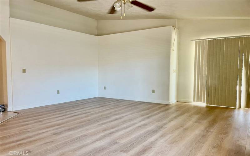 Fireplace-adorned Large Living Room with brand new Flooring