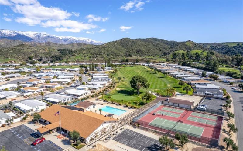 Arial View of Clubhouse, courts, pool and golf course