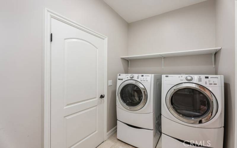 Laundry Room with access to garage and Hallway