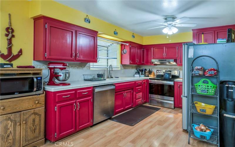 Cozy kitchen with stainless steel appliances.