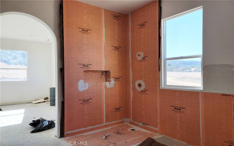 Master shower with tile to go up to the 12' high ceiling