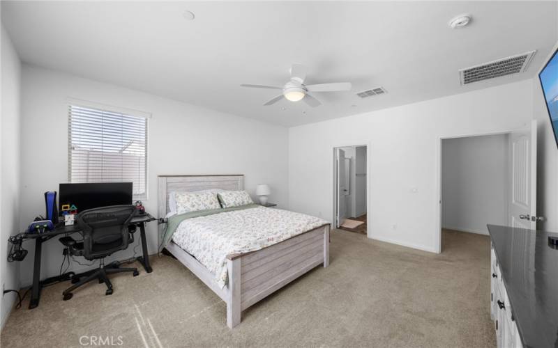 Good size primary bedroom with ceiling fan